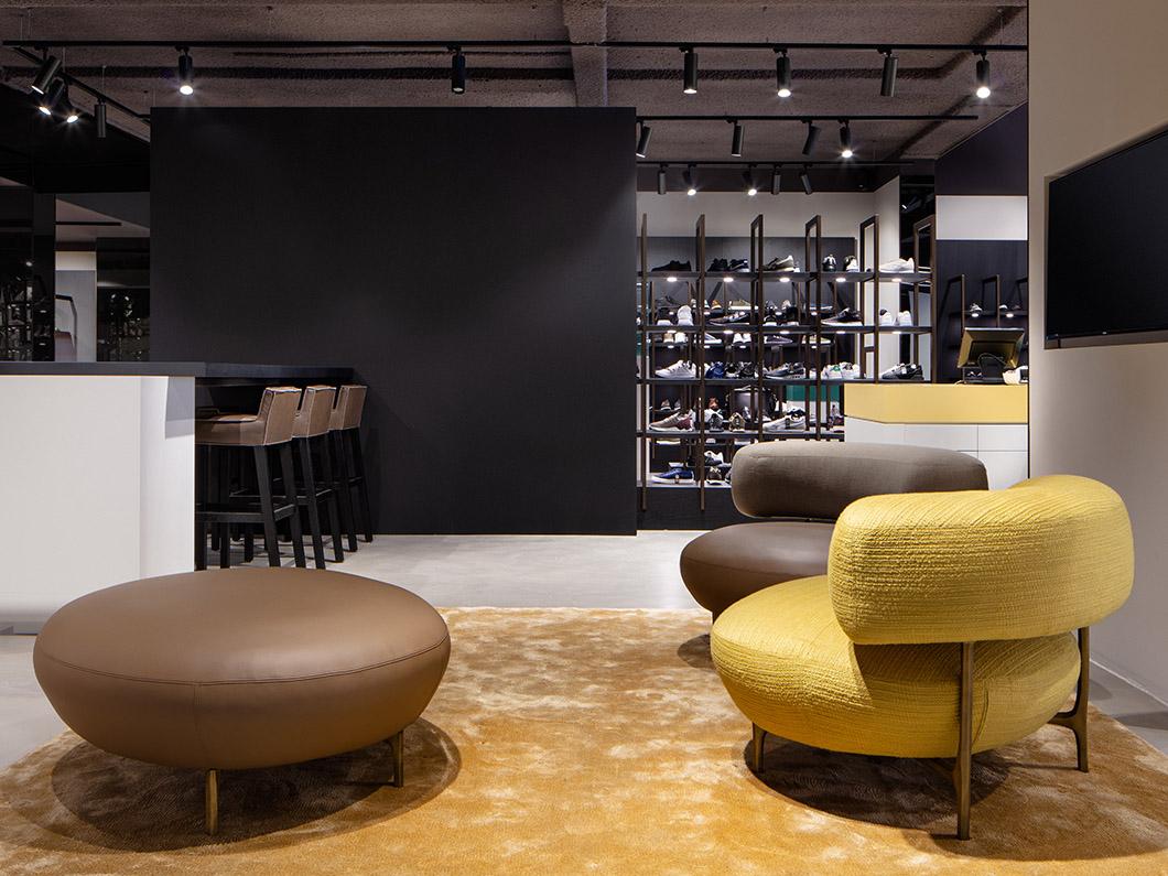 ELLA armchair & pouf and SAAR bar stool at Omoda Flagship Store in Amsterdam