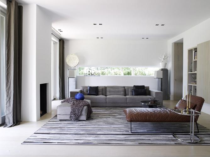 Rotterdam cubist villa with DIEKE sofa and pouf and KEKKE longchair, ITSKE coffee table, KLAAR lighting by Maretti and hardware ONE by Formani
